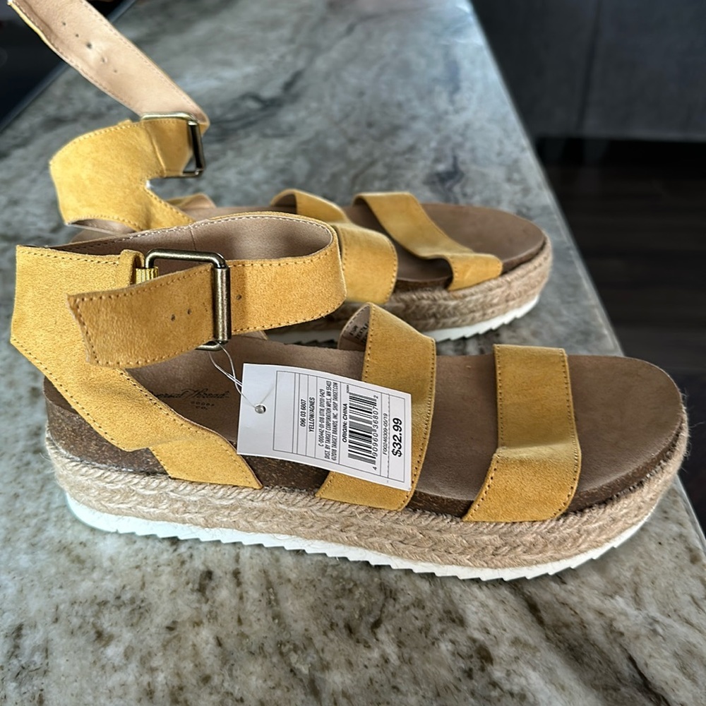 Yellow wedge sandals